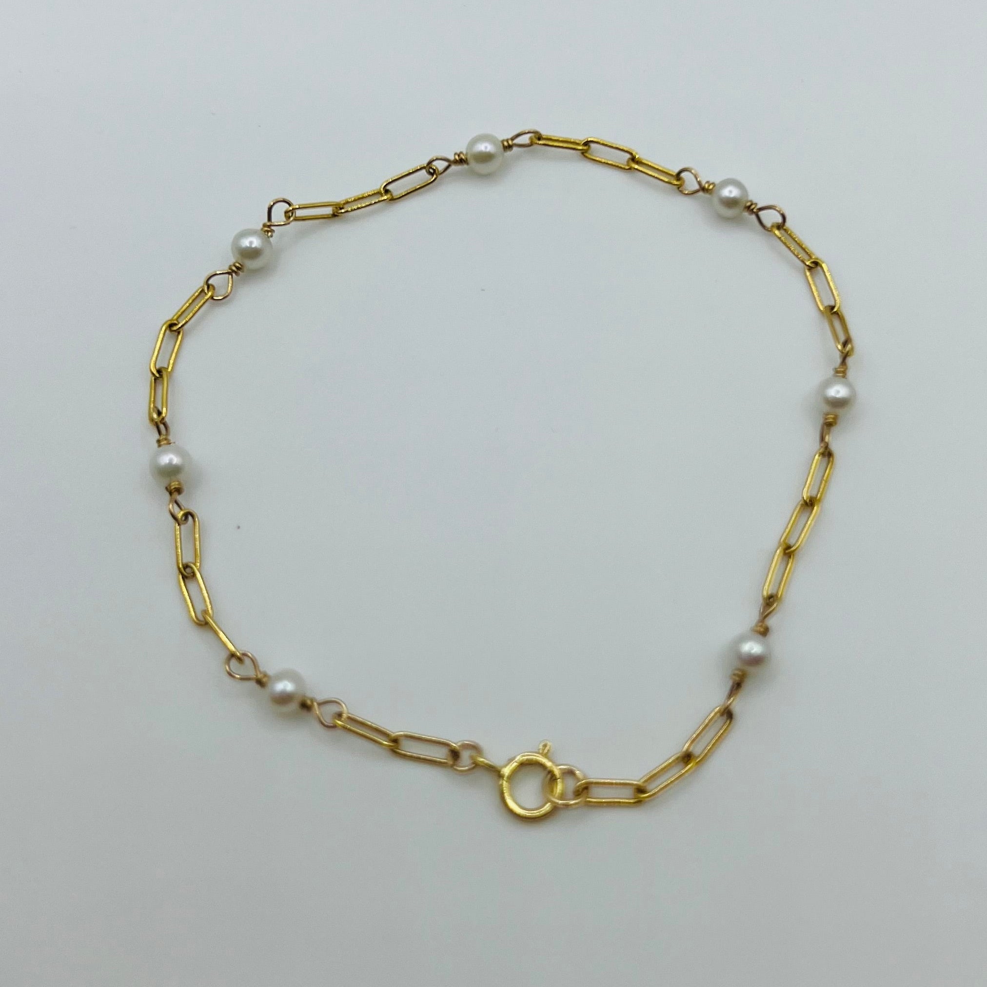 Scattered Pearl Chain Bracelet flat lay on white background